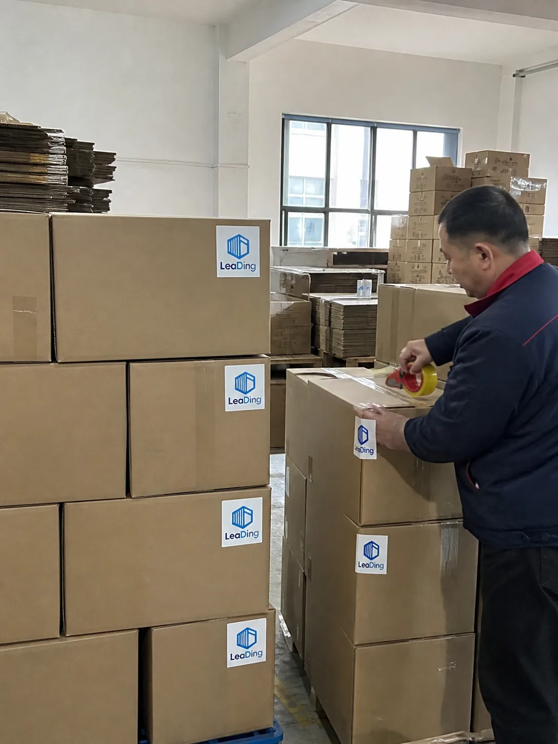LeaDing-labelled cartons prepared for loading at a factory facility